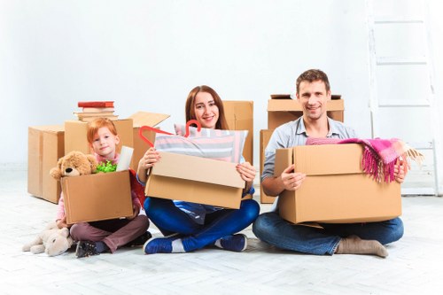 Packed boxes and furniture ready for transport during a local house removal