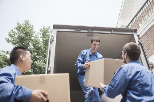 Furniture and boxes being transported by a Herne Hill van service