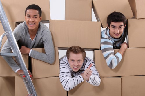 Professional movers handling stair access in a Herne Hill flat move