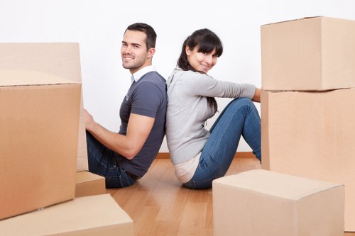 Local office removal service preparing furniture and equipment for transport